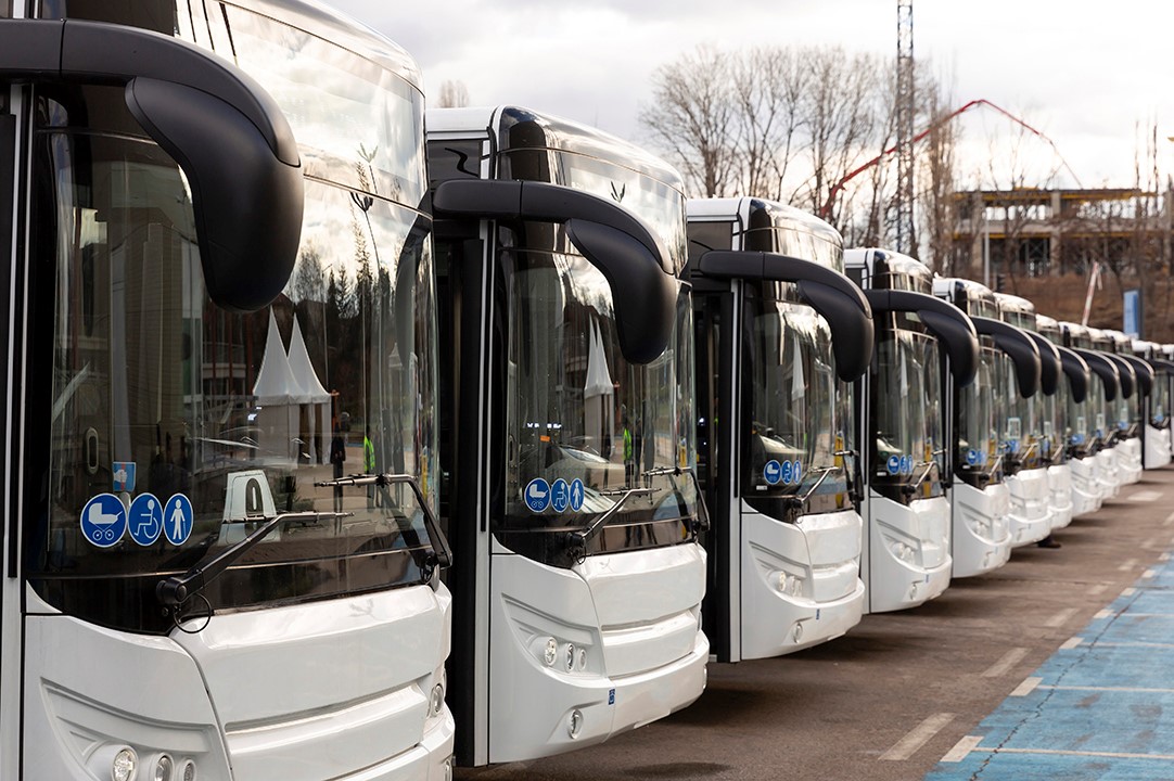 Image of busses lined up in a row